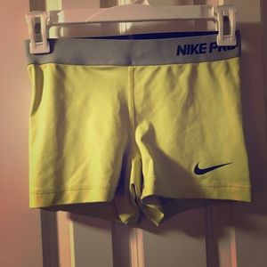 Yellow Nike pro spandex
